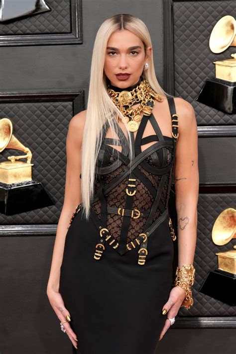 versace gold and black gown|Versace dress black and gold.